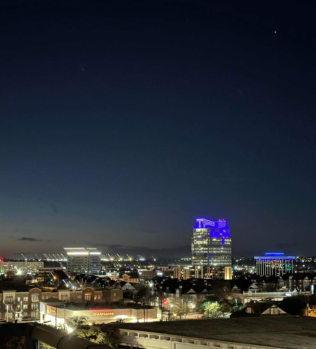 The future Fort Worth City Hall, formerly the Pier One headquarters, is illuminated in purple on Dec. 31, 2022, in honor of TCU playing in the College Football Playoff semifinal against No. 2 Michigan that night.