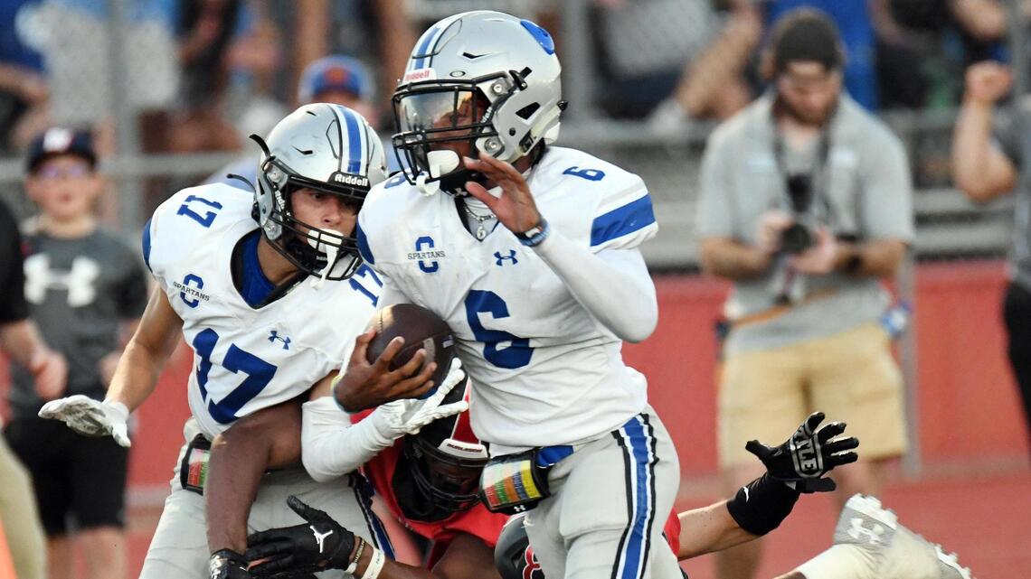 Northwest has no answer for Centennial rushing attack as Spartans lock up second seed