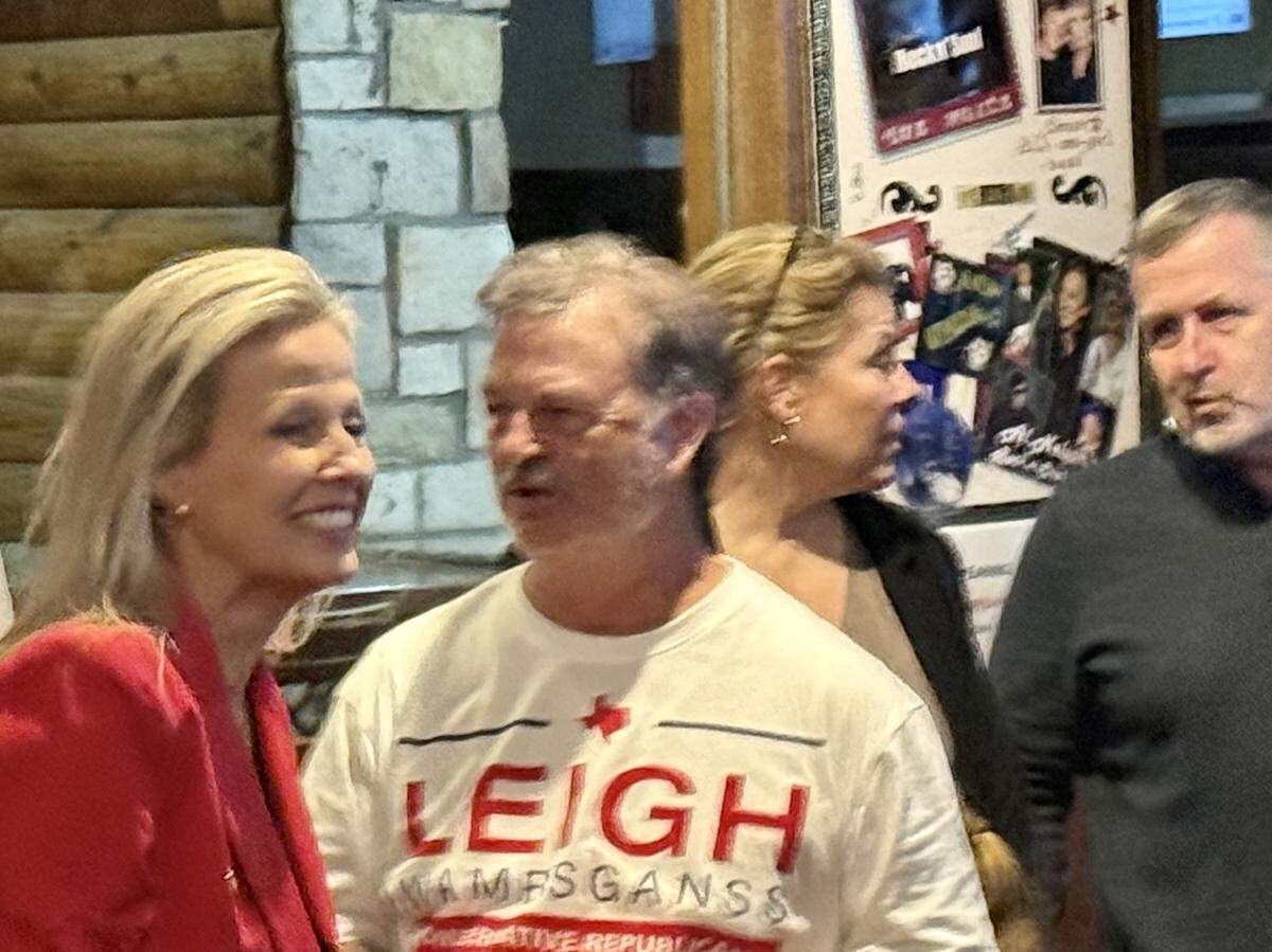 Republican Leigh Wambsganss of Southlake greets her backers as she arrives for her party after qualifying for the state Senate District 9 special election runoff. The event was at Niki’s Italian Bistro in North Richland Hills, Texas, Nov. 4, 2025