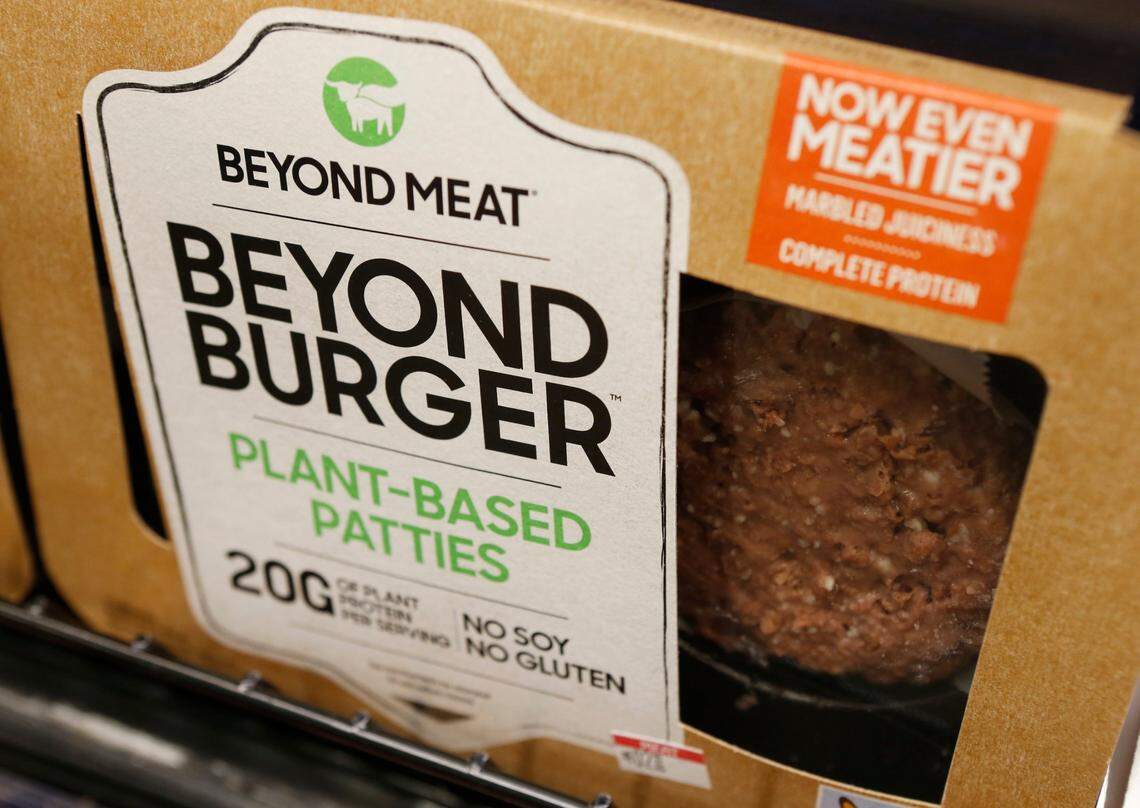 FILE - In this June 27, 2019, file photo a meatless burger patty called Beyond Burger made by Beyond Meat is displayed at a grocery store in Richmond, Va. Plant-based meat maker Beyond Meat said Thursday, Aug. 5, 2021 that its revenue jumped 32% in the second quarter as demand from restaurants returned. (AP Photo/Steve Helber, File)
