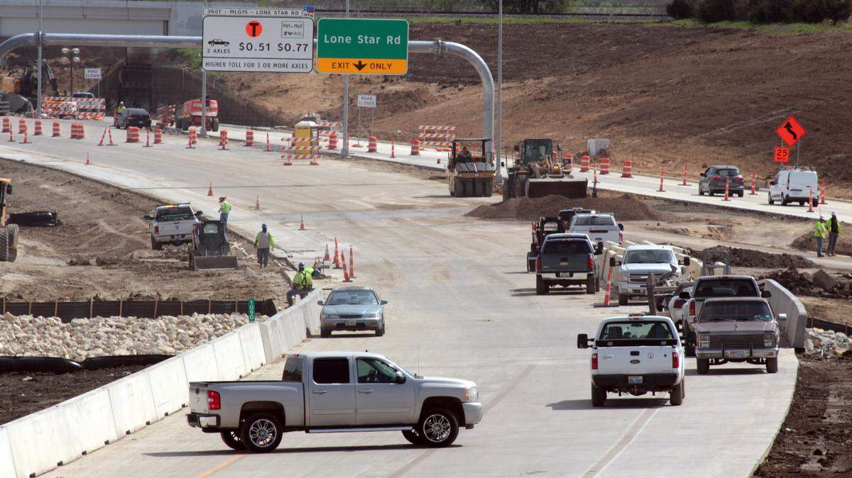 Construction continues on the Texas 360 toll road, south from the Heritage Parkway bridge in Mansfield. The road is scheduled to open in May.