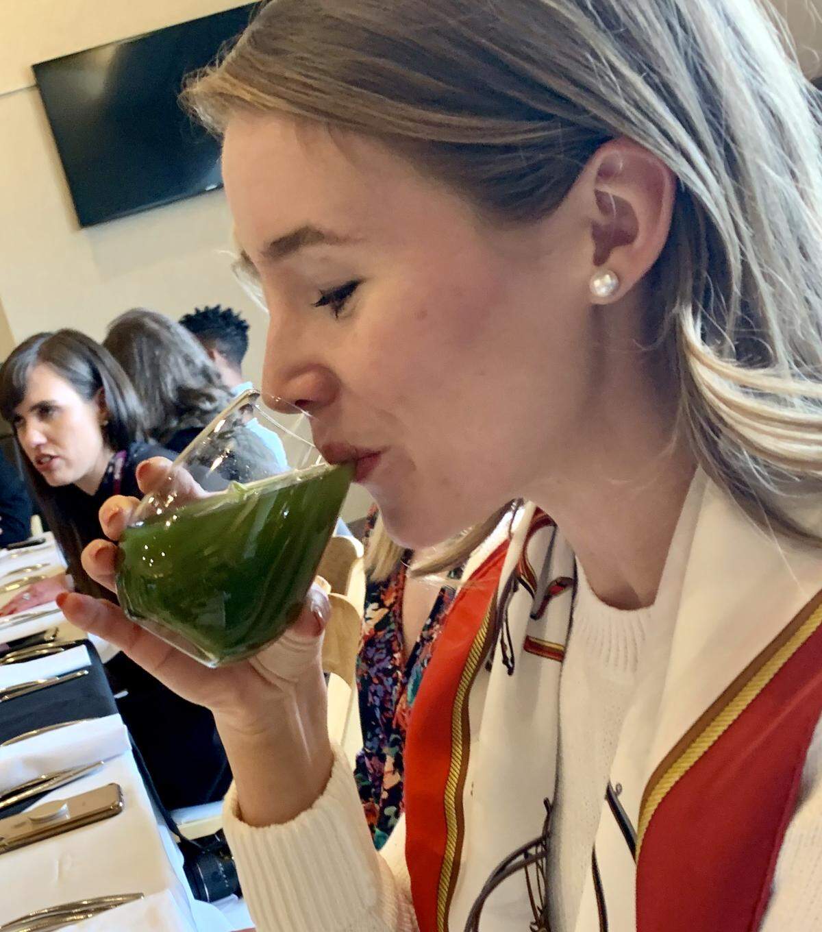 Kate Padgitt of Dallas, who writes a fashion blog kown as www.lonestarsouthern.com, samples a mint and lemon drink offered to Qatar Airways travelers.