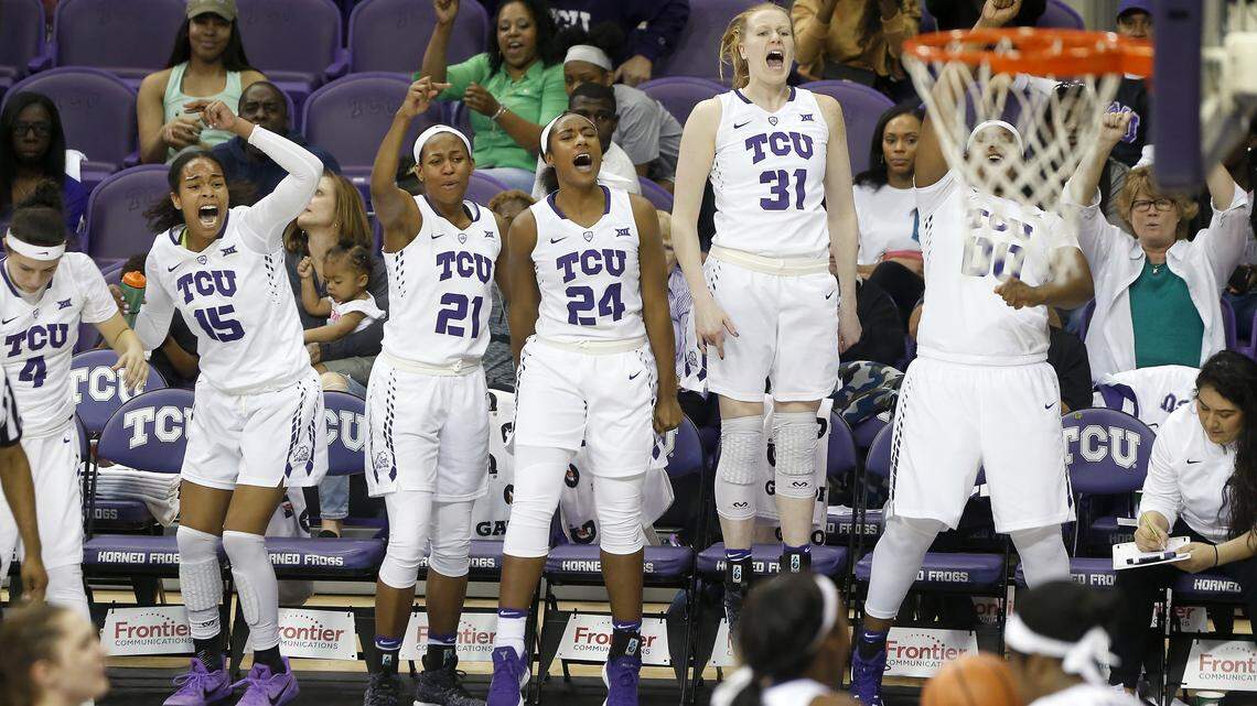 The TCU bench reacts to a three-point play in the Horned Frogs' 86-51 win over Missouri State in a second round game of the WNIT tournament on Saturday at Schollmaier Arena.