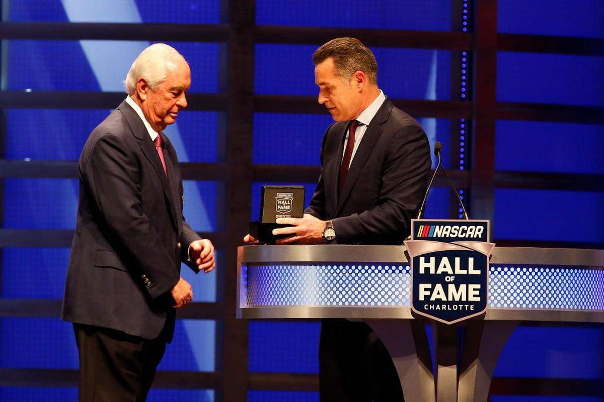 CHARLOTTE, NORTH CAROLINA - FEBRUARY 01: Roger Penske stands on stage as Greg Penske speaks during the 2019 NASCAR Hall of Fame Induction Ceremony at the Charlotte Convention Center on February 01, 2019 in Charlotte, North Carolina. (Photo by Brian Lawdermilk/Getty Images)