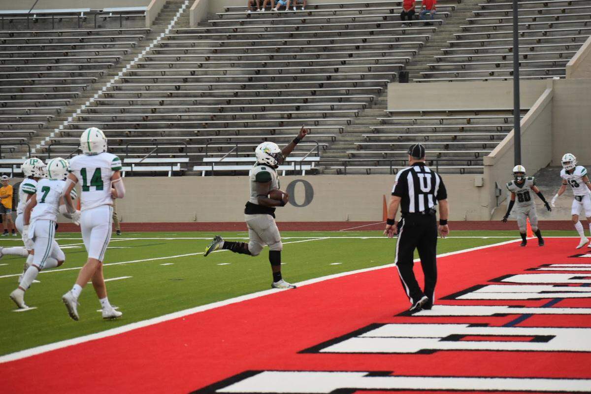 Benbrook’s Chris Harris (9) scores a touchdown for the Bobcats in the second quarter of a high school football game against Iowa Park at Farrington Field in Fort Worth, Texas Thursday, August 31, 2023.