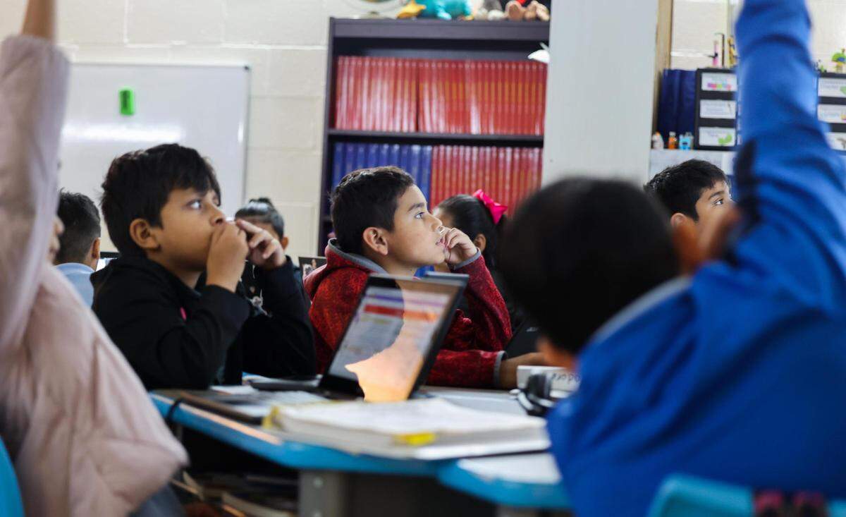 Students participate in Agustin Tiliano’s fifth-grade bilingual class at the Leadership Academy at Mitchell Boulevard Elementary.