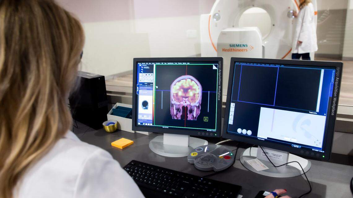 Marcie Aguilar and Hayley Burnett train on the newest CAT scan available inside the Imaging Center at University of North Texas Health Center.