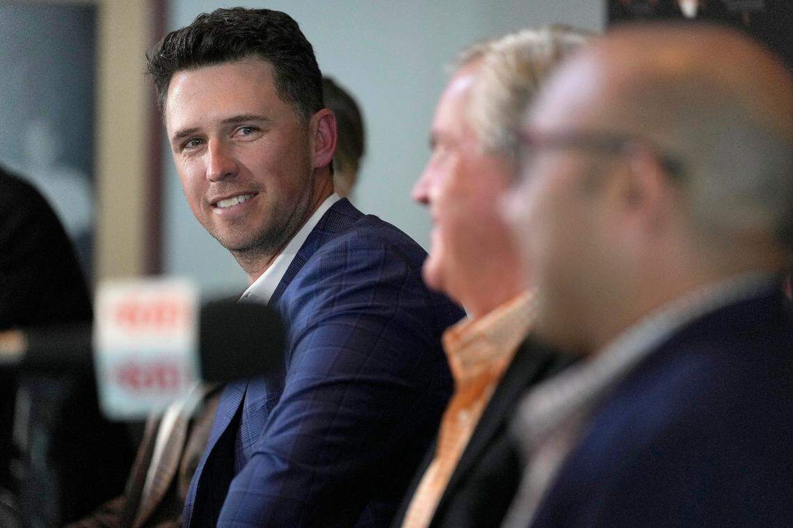 San Francisco Giants catcher Buster Posey smiles during a news conference announcing his retirement from baseball, Thursday, Nov. 4, 2021, in San Francisco. (AP Photo/Tony Avelar)