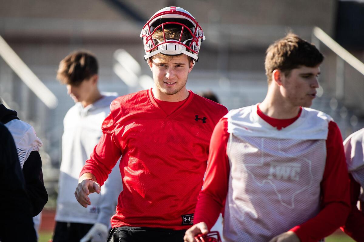 Quarterback Carson Cross walks off the field after football practice Thursday, Oct. 29, 2020, at Fort Worth Christian School. Cross will be facing his younger brother at the rivalry game against Grapevine Faith on Nov. 6.