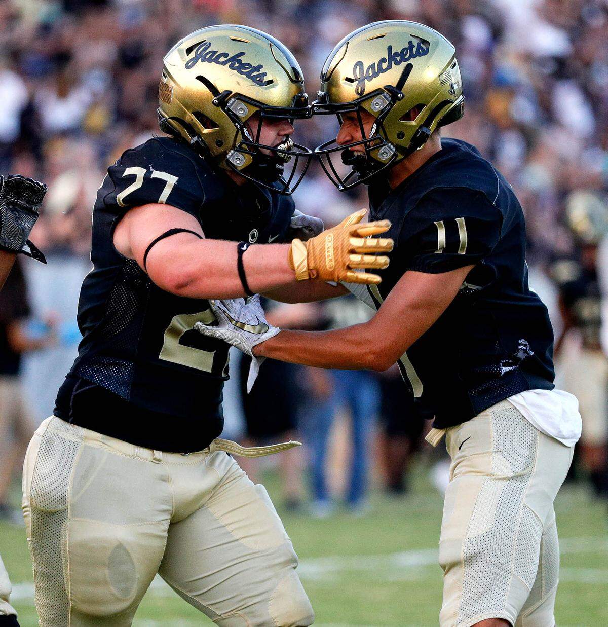Cleburne tight end Tyler Forsythe (27) and wide receiver Jason Pugh(11) celebrate after Forsythe’s touchdown reception against Weatherford during the first half, Friday night, September 10, 2021 played at Yellow Jacket Stadium in Cleburne, TX. (Steve Nurenberg Special to the Star-Telegram)