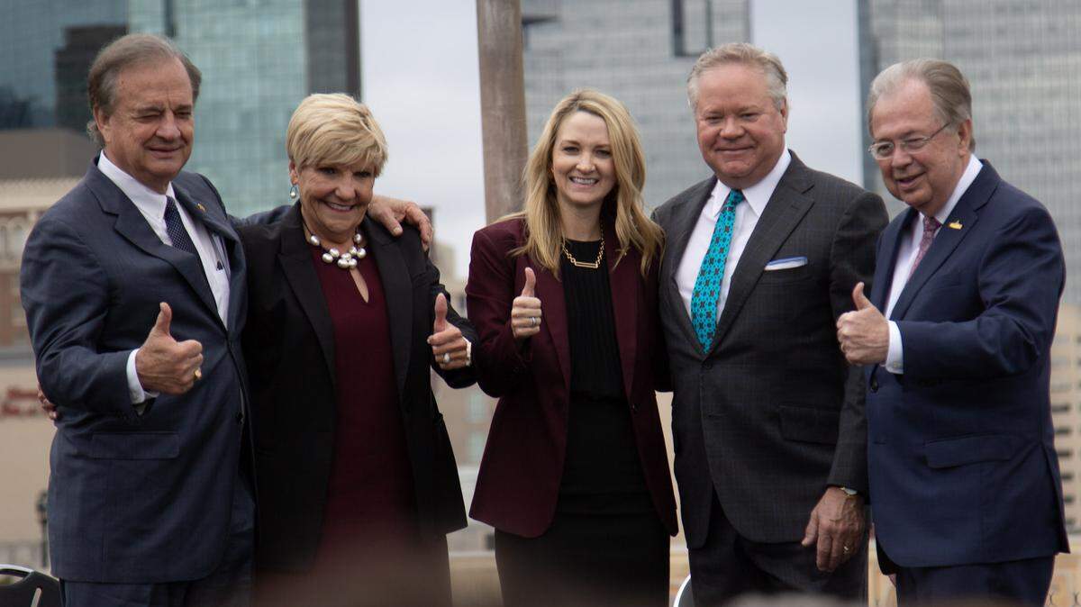 Texas A&M Chancellor John Sharp, former Fort Worth Mayor Betsy Price, Fort Worth Mayor Mattie Parker, developer John Goff, and Tarrant County Judge Glen Whitley celebrate the announcement of Texas A&M’s Fort Worth expansion.