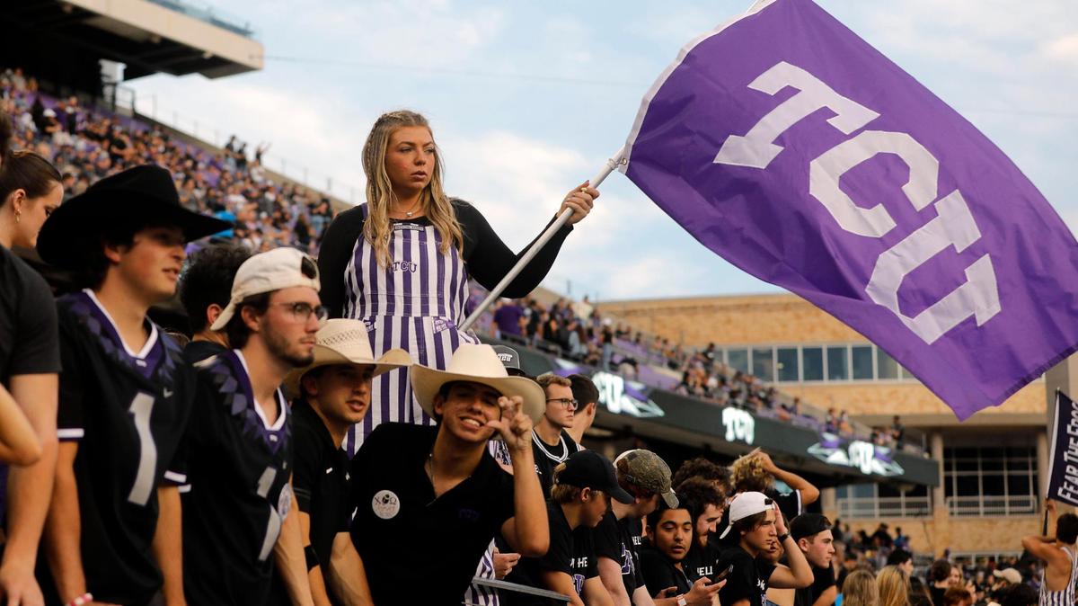 TCU fans celebrate before the Horned Frogs’ game against Kansas State on Oct. 22 at Amon G. Carter Stadium.