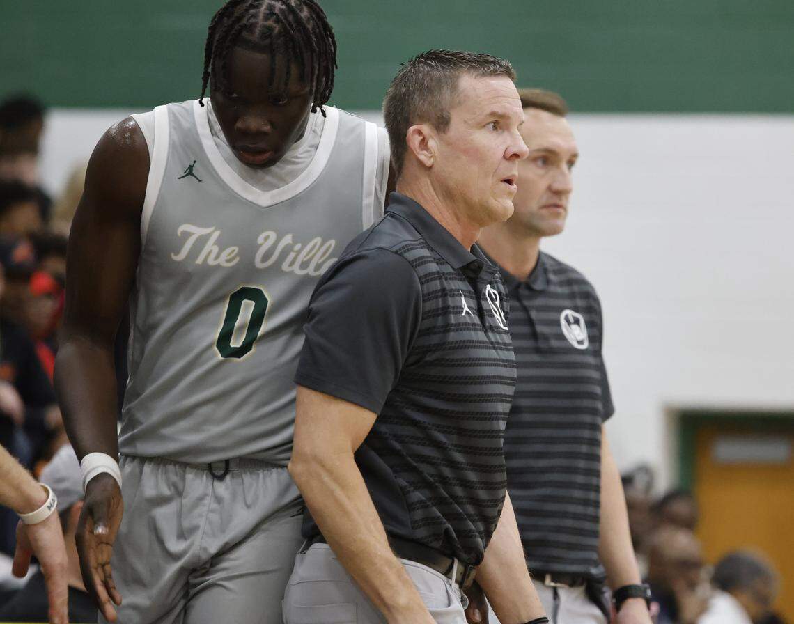 Birdville forward Gabriel Zachariah (0) walks behind assistant coach Sean Tippett and head coach Anthony Holman during the second half of a game against Denton Ryan in a UIL basketball game at Birdville High School in North Richland Hills, Texas, Tuesday Feb. 17, 2026.