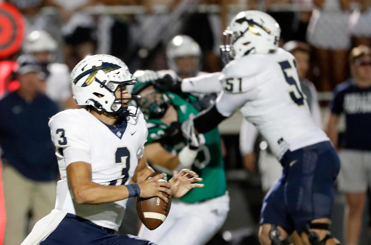 Keller quarterback Tre Guerra (3) looks for a receiver downfield in the first half of a District 4-6A high school football game at Dragon Stadium in Southlake, Texas, Friday, Oct. 07, 2022. Keller led Carroll by four at the half. (Special to the Star-Telegram Bob Booth)