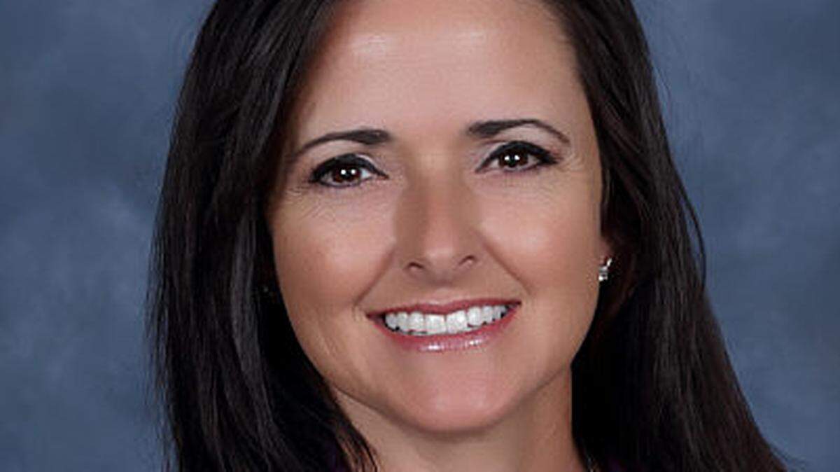 Courtney Lackey Wilson announced her resignation as president of the Mansfield School Board.