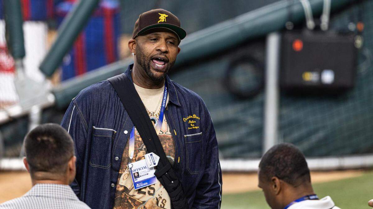 Former MLB Pitcher C.C. Sabathia speaks with bystanders on the field prior to game one of the World Series between the Texas Rangers and the Arizona Diamondbacks at Globe Life Field in Arlington on Friday, Oct. 27, 2023.