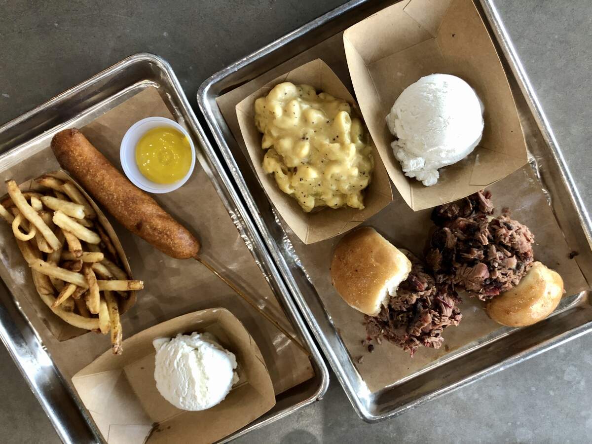Child’s plates at Heim BBQ: a corny dog with fries and ice cream, left, or brisket sliders with green chile mac-and-cheese and ice cream.