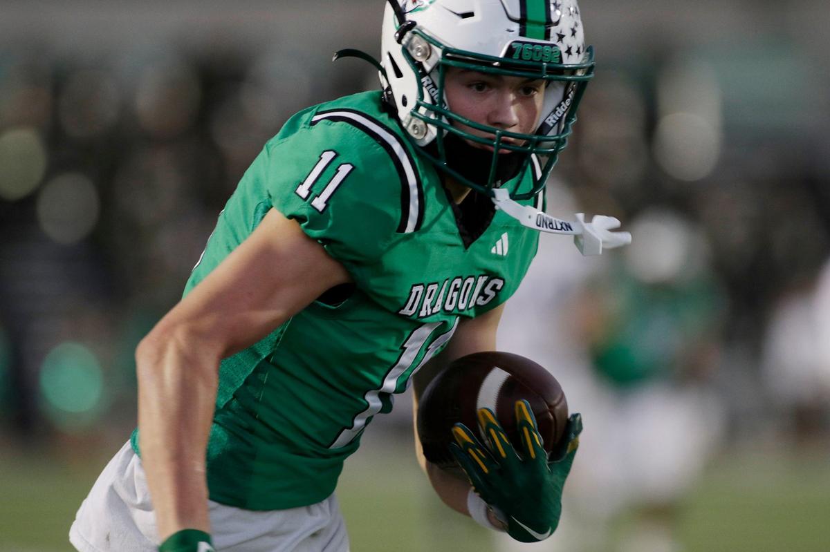 Southlake Carroll’s Brock Boyd heads for the end zone for a first-quarter touchdown against Timber Creek last season at Dragon Stadium.