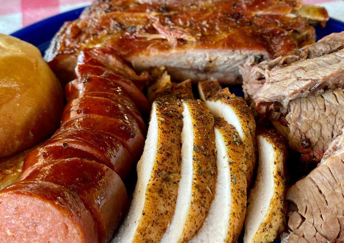 Sausage, spareribs, smoked chicken breast and brisket at Smokey’s BBQ in Fort Worth.