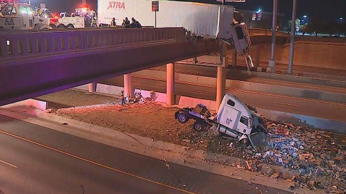 A truck driver was critically injured Sunday night after his tractor-trailer crashed through a wall and fell onto Northeast Loop 820 in North Richland Hills.