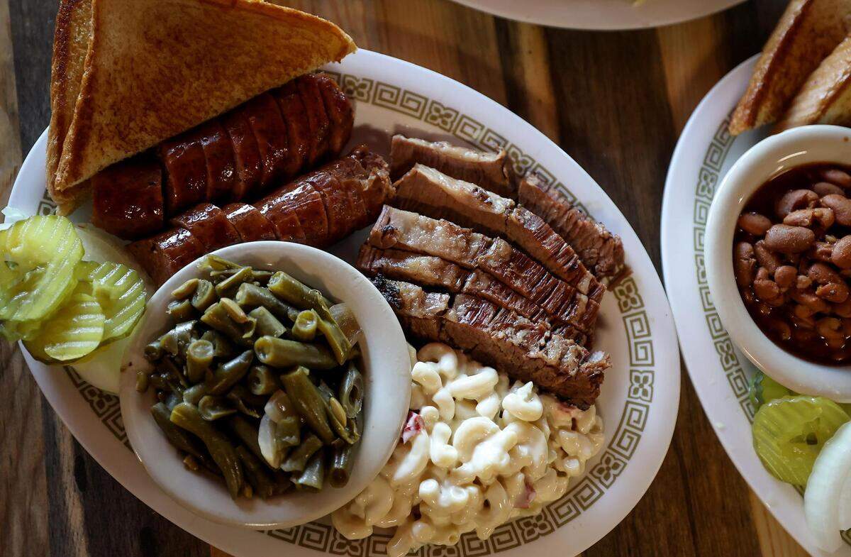 The combo plate featuring sausage and brisket at Hickory Stick Barbecue in Everman. Hickory Stick Barbecue was voted best barbecue in the Fort Worth Star-Telegram’s Readers’ Choice.