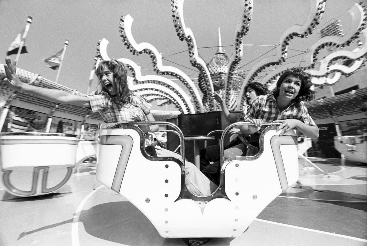 Oct. 8, 1978: Visitors to the State Fair of Texas spinning around on a carnival ride.