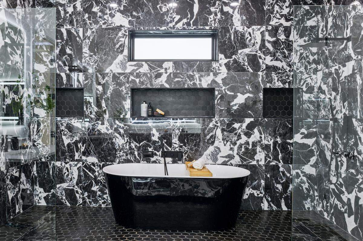 The primary bathroom, one of four in the house along with four bedrooms.