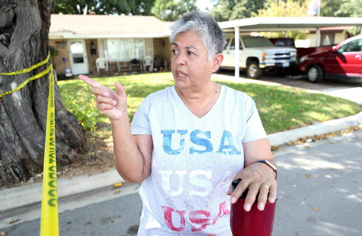 Lake Worth resident Monica Wilson describes what she heard and saw after a military training jet crashed into the backyard a few houses down from her on Sunday, September 19, 2021. Two Navy pilots who were on a training flight ejected from the plane and were taken to local hospitals with serious injuries, authorities said.
