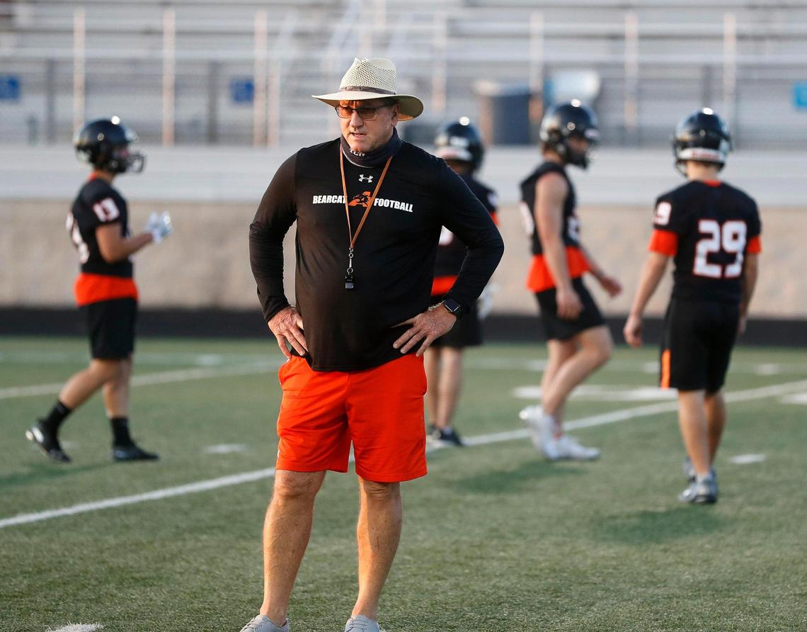 Aledo head coach Tim Buchanan watches receiver drills during football practice earlier this season. The defending 5A state champs are 4-1, but COVID-19 is the foe that garners the most concern.
