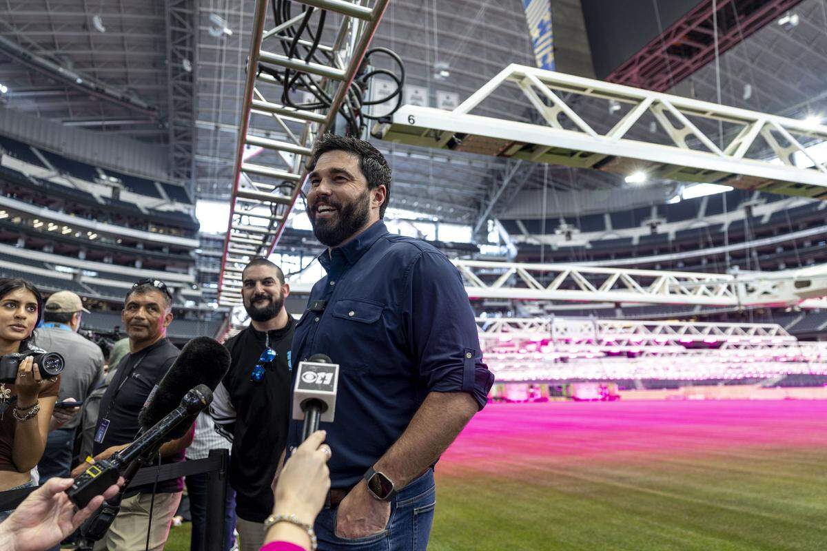 Tod Martin, stadium general manager, speaks to the media about preparations, including the installation of a natural grass pitch, being made for FIFA World Cup 2026 on Thursday, May 14, 2026 in Arlington, Texas. The stadium will host nine matches during the World Cup this summer.