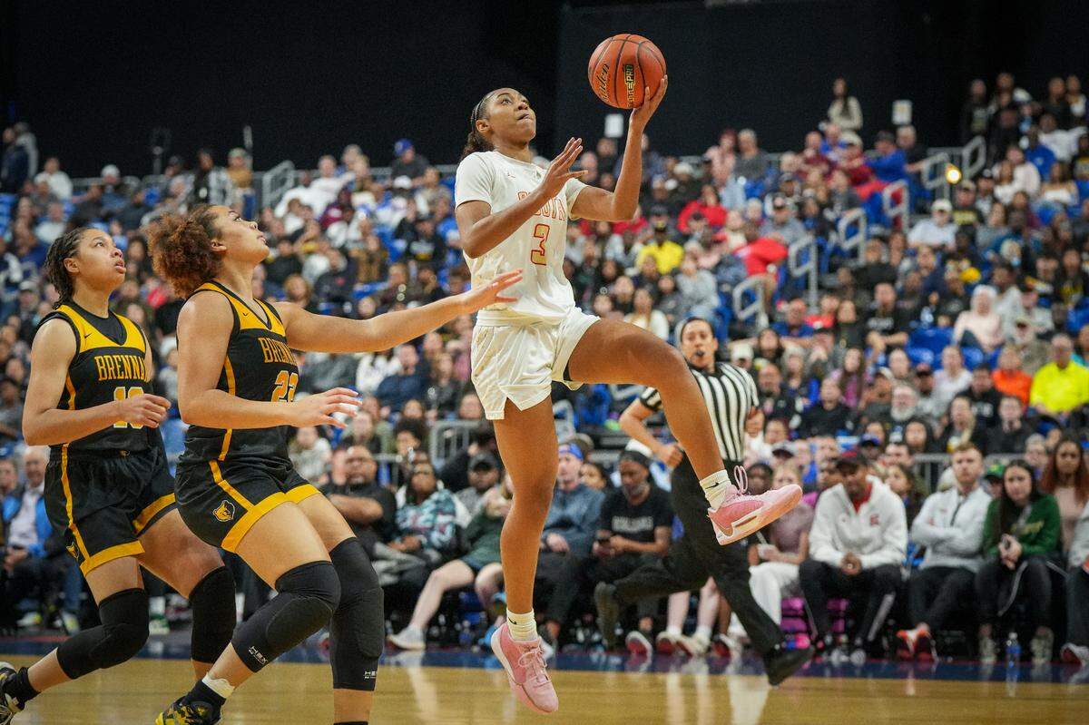 South Grand Prairie’s Taylor Barnes goes up for two of her game-high 24 points against San Antonio Brennan in a Class 6A state semifinal on Friday, March 1, 2024 at the Alamodome in San Antonio, Texas. SGP defeated Brennan 53-42.