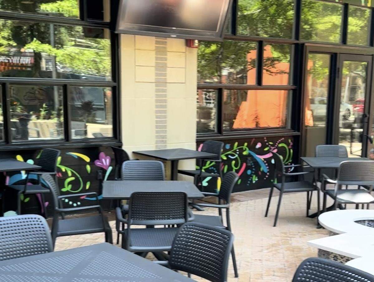 The patio at colorful La Cabrona in Artisan Circle.