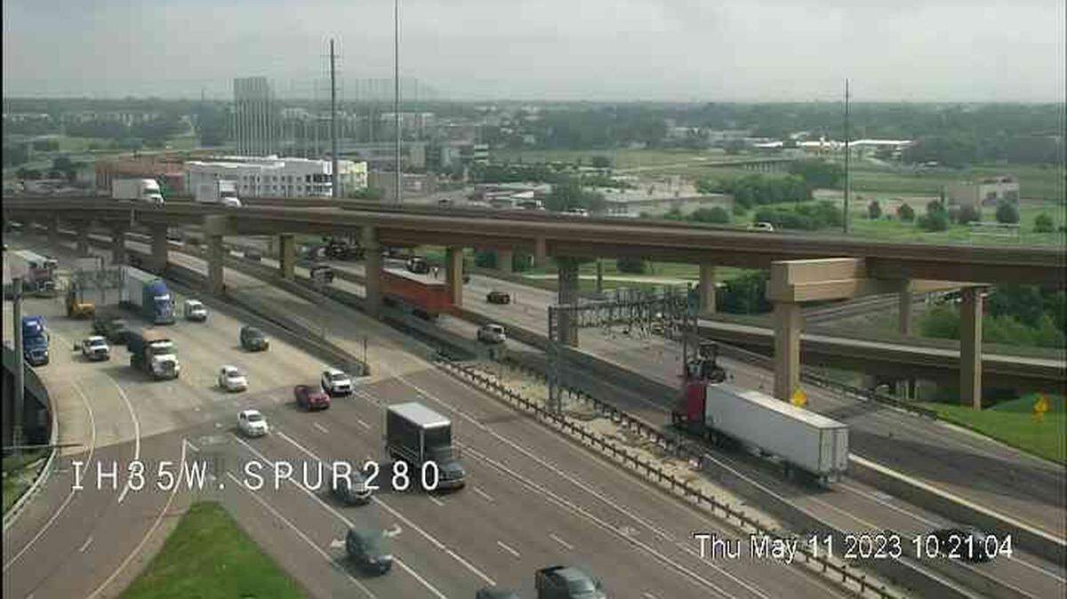 Fort Worth police respond to a crash that is blocking traffic Thursday morning, May 11, 2023, on northbound I-35W near downtown.