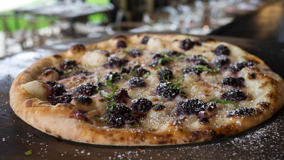 The blackberry and marscapone dessert pizza at Delucca Gaucho Pizza and Wine.