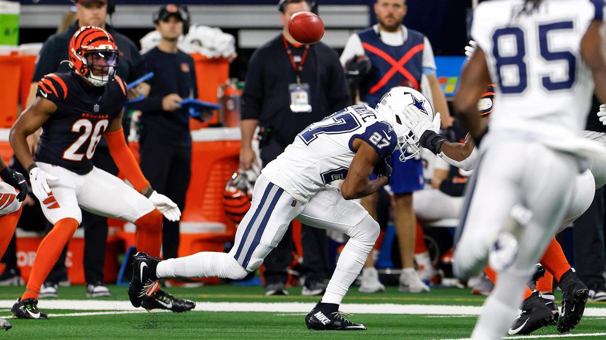 The football escapes after being touched by Dallas Cowboys’ Amani Oruwariye during the Cincinnati Bengals’ fourth quarter kick on Monday, Dec. 9, 2024, at AT&T Stadium in Arlington. The ball was recovered by the Bengals, setting up the game-winning touchdown.