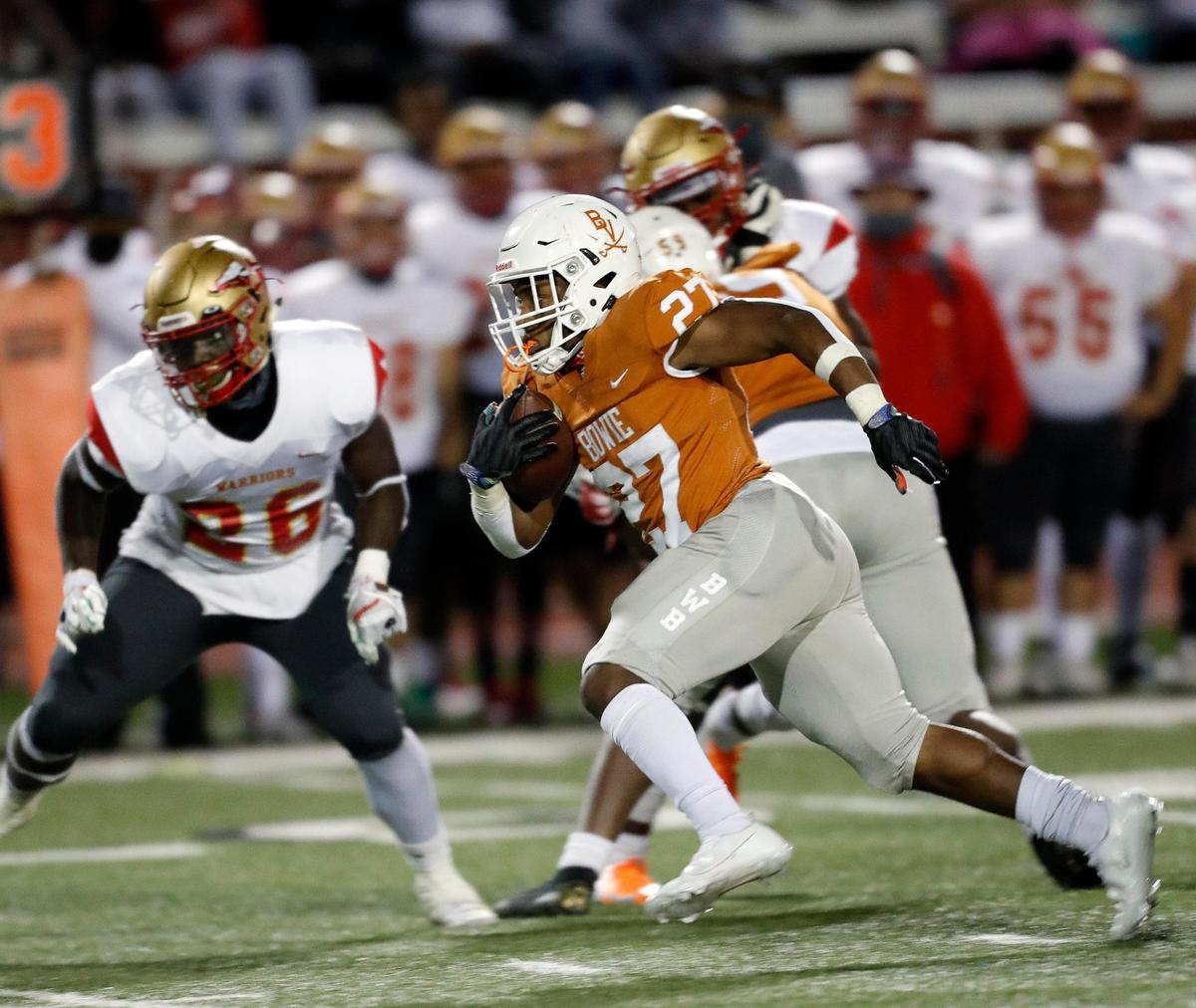 Bowie defensive back Kameron Sanders (27) runs the ball in the second half of a high school football game at Wilemon Field in Arlington, Texas, Thursday, Oct. 15, 2020. Bowie defeated South Grand Prairie 28-14. (Special to the Star-Telegram Bob Booth)
