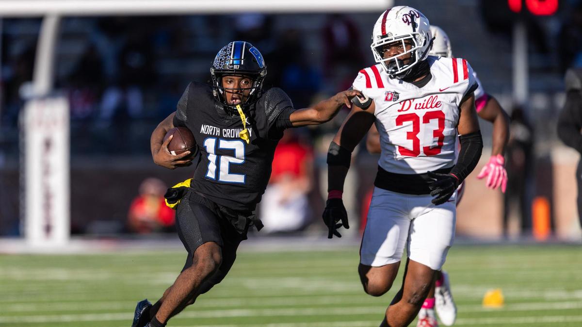 North Crowley quarterback Chris Jimerson Jr. (12) runs up field on a quarterback keep play in the first half of the Class 6A Division I state semifinal game at Eagle Stadium in Allen on Saturday, Dec. 14, 2024.