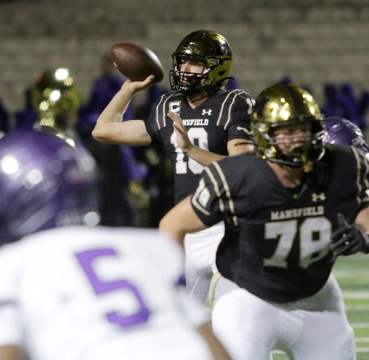 Mansfield’s Braxton Van Cleave throws a pass during a UIL football game at Newsome Stadium on Saturday , October 10, 2024.