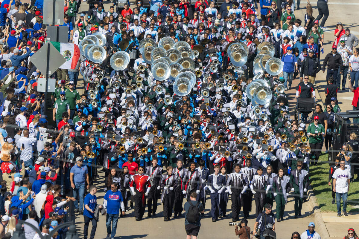 Marching bands perform during the World Series parade Friday, Nov. 3, 2023, in Arlington.