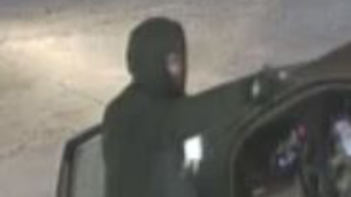 Lewisville police released a photo of the Liquor City robbery and shooting suspect.