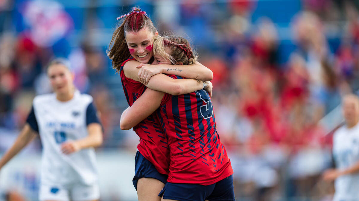 Grapevine’s Maddison Patton (9) gets a hug from a teammate after scoring one of her two goals against Montgomery Lake Creek in the UIL Class 5A Division II state soccer championship game on Friday, April 10, 2026, at Birkelbach Field in Georgetown, Texas.