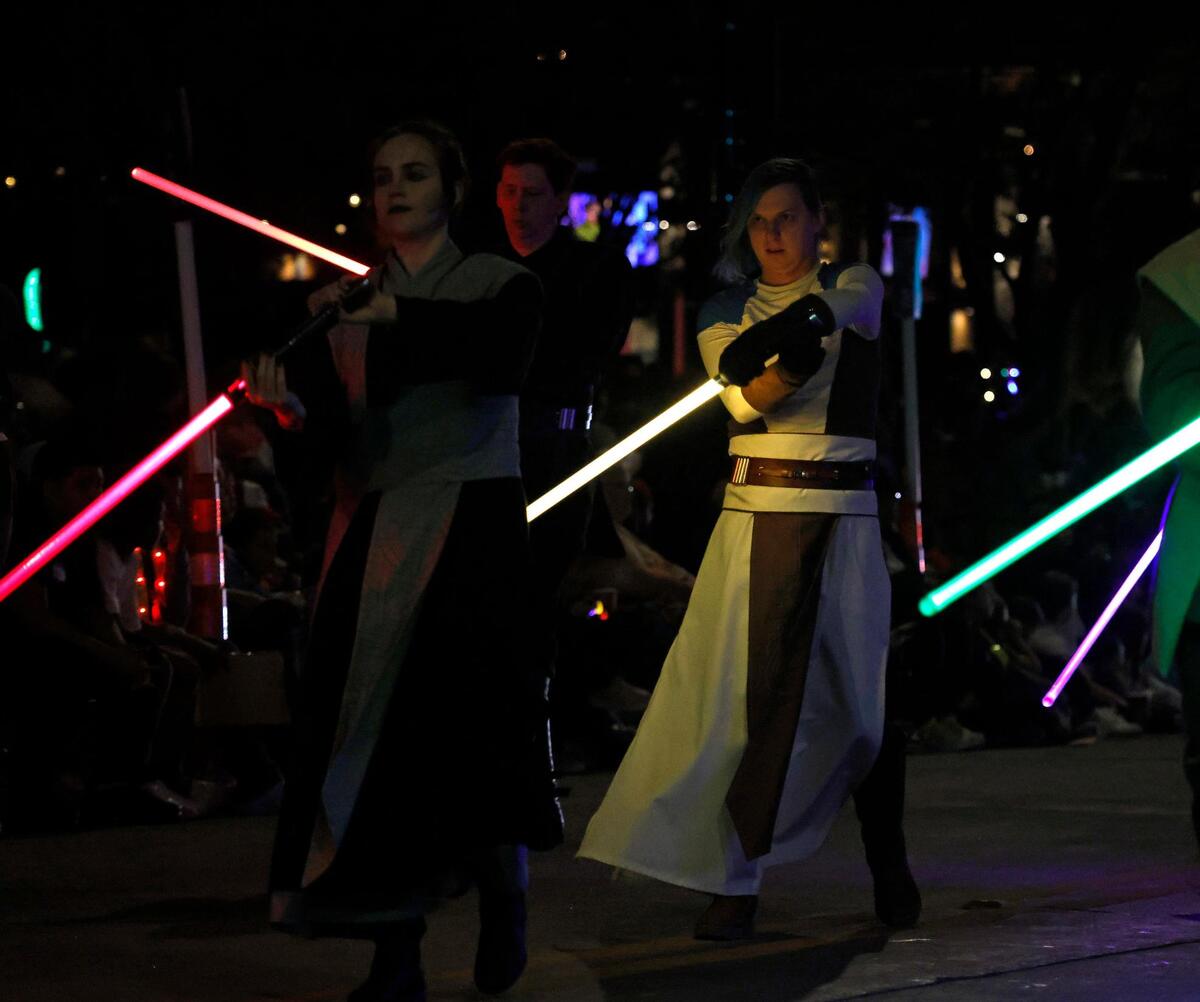 Jedi Knights wielded their light sabers during the 2024 Parade of Lights on Sunday.
