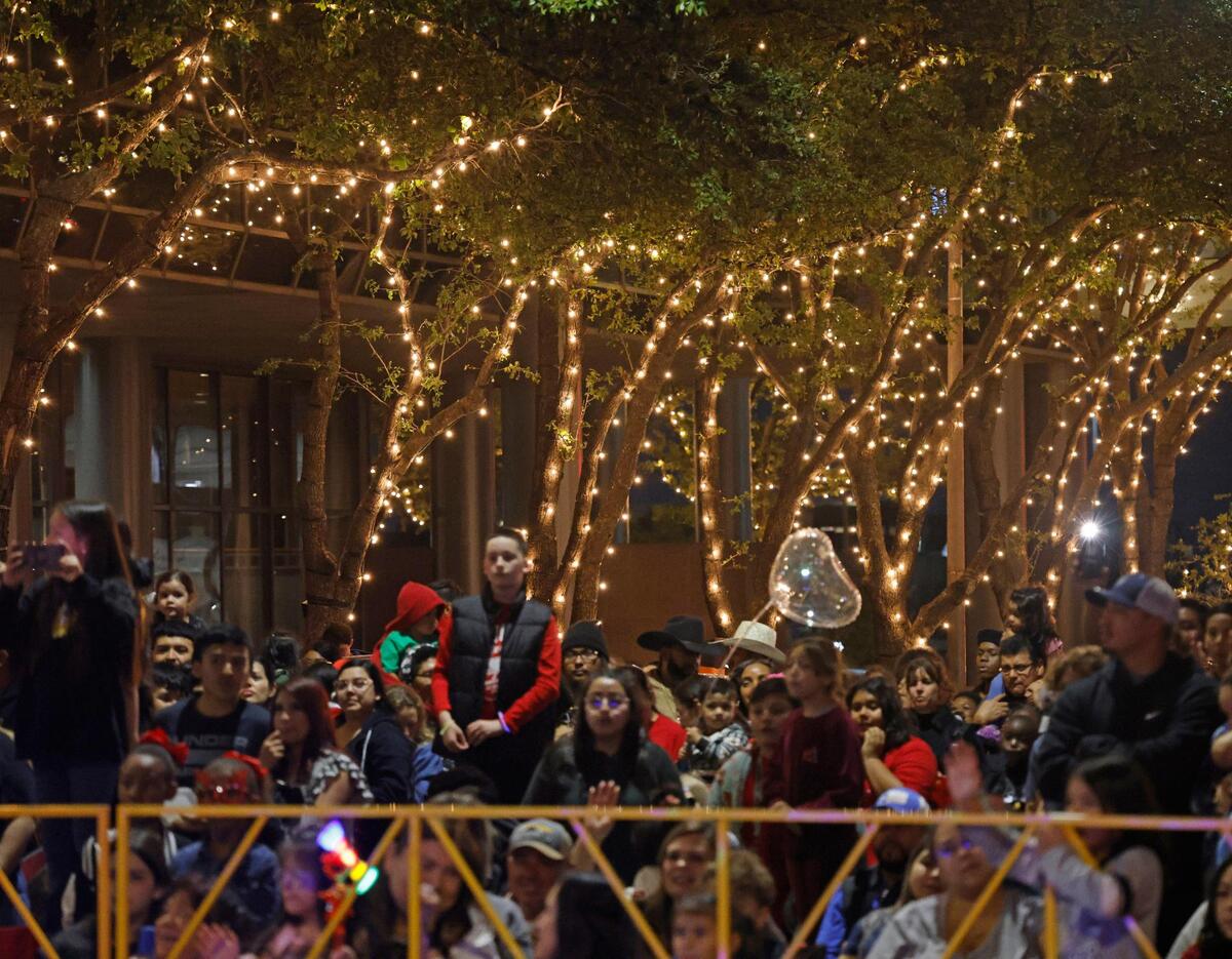 Parade-goers lined the streets in some places eight to 10 rows deep during the 2024 Parade of Lights in Fort Worth on Sunday.