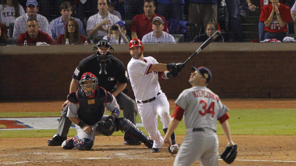 The best of the Texas Rangers: Catcher Mike Napoli (25) hits a decisive double in the eighth inning that put the Rangers ahead of the St. Louis Cardinals in Game 5 of the 2011 World Series. The Rangers would take a 3-2 series lead on October 24, 2011. (Star-Telegram/Rodger Mallison)