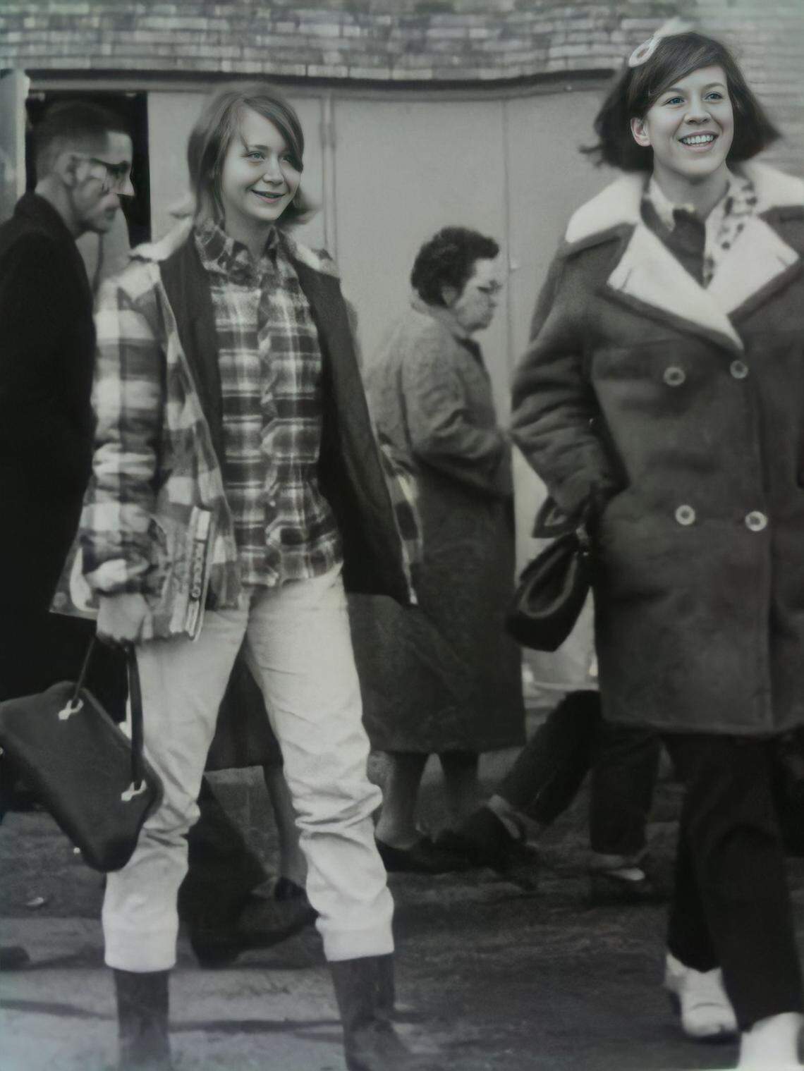 In Bea Watson’s family photos, one was a candid 1964 snapshot of her daughter Cathryn Seymour (right) and a friend, Margo Kyger, at the Stock Show midway. The couple in the background is Bud and Liona Kennedy, and a young Bud Kennedy is behind Cathryn.