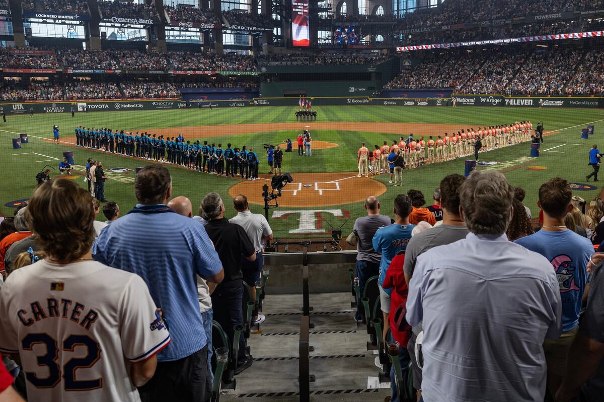 Fans stand up as the National League and American League all star line ups are announced prior to the MLB All Star Game at Globe Life Field in Arlington on Tuesday July 16, 2024.