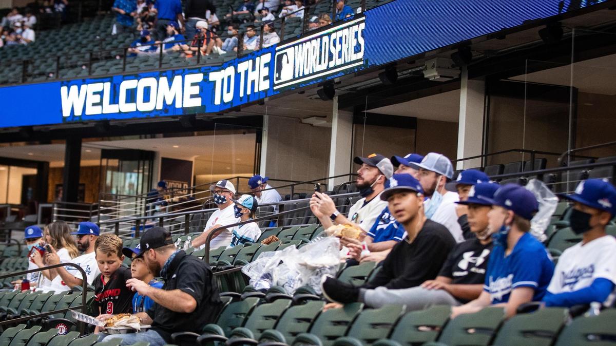 Los Angeles Dodgers fans take their seats before Game 2 of the World Series between the Los Angeles Dodgers and Tampa Bay Rays Wednesday, Oct. 21, 2020, at Globe Life Field in Arlington. Globe Life will host a college baseball tournament Saturday-Monday featuring six teams from the Big 12 and SEC, including TCU.