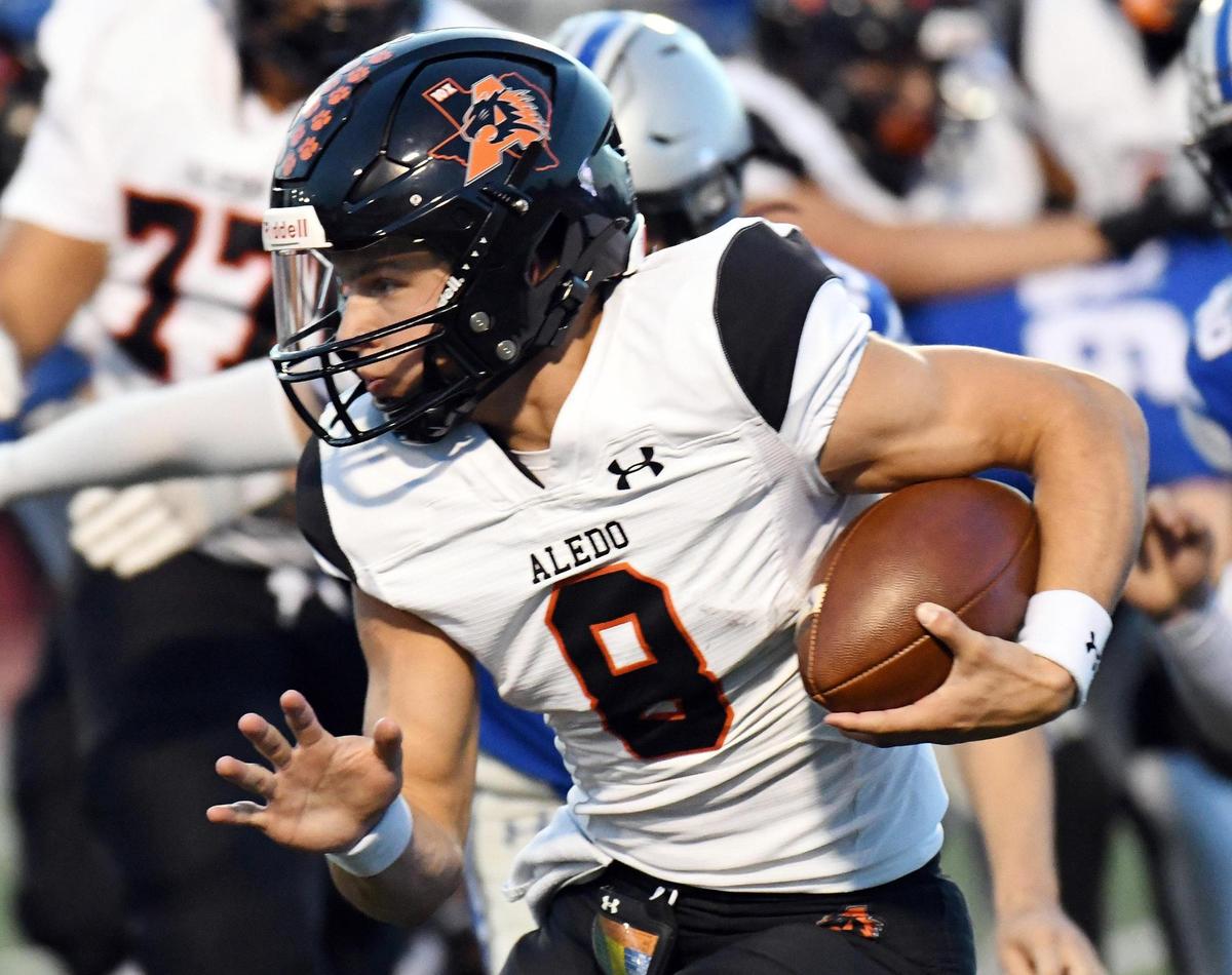 Aledo quarterback Hauss Henjy runs for a first down against Centennial in the first quarter of Friday’s October 14, 2022 District 3-5A Division 1 football game at Burleson ISD Stadium in Burleson, Texas. Special/Bob Haynes