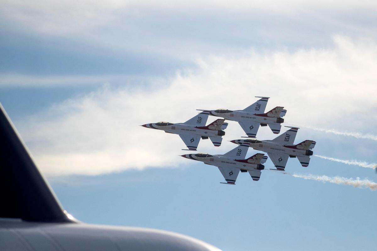 A squadron of U.S. Air Force Thunderbirds blast across the airspace above the Fort Worth Alliance airport during the AllianceTexas Aviation Expo presented by Bell in Fort Worth on Saturday, Oct. 22, 2022.