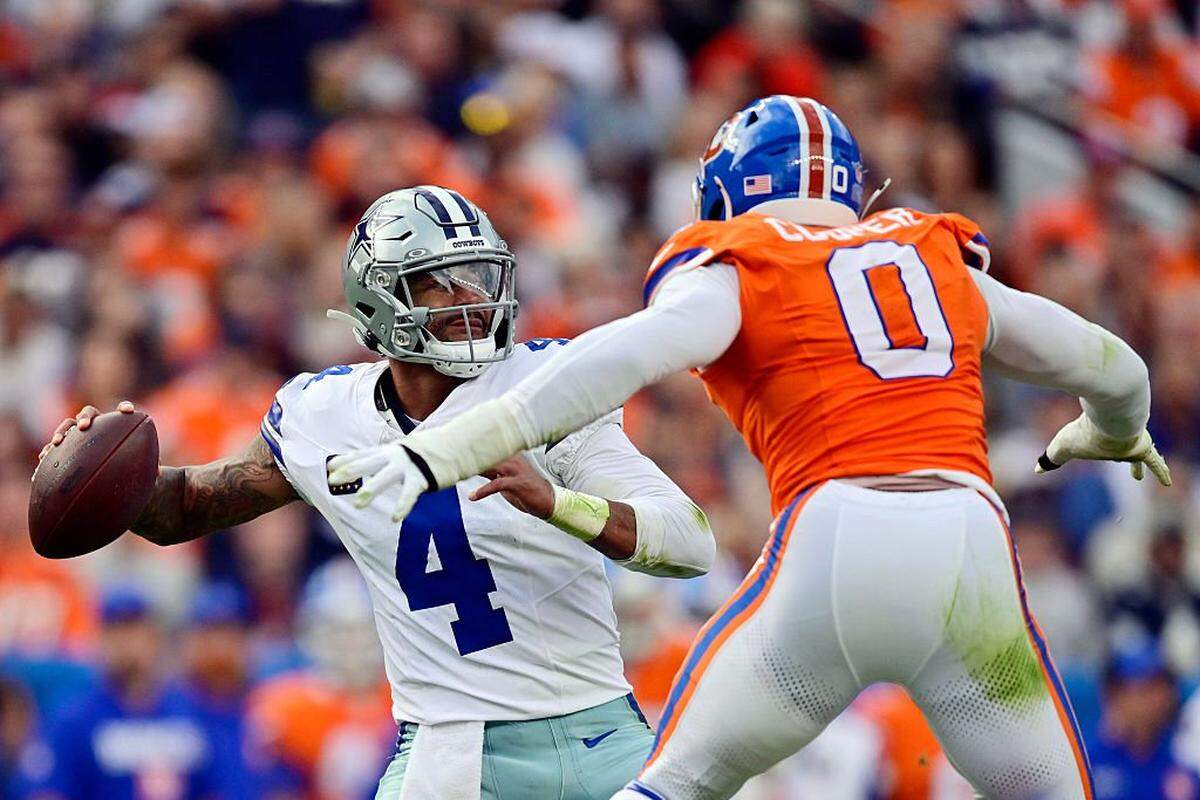 DENVER, COLORADO - OCTOBER 26: Jonathon Cooper #0 of the Denver Broncos pressures Dak Prescott #4 of the Dallas Cowboys during the third quarter in the game at Empower Field At Mile High on October 26, 2025 in Denver, Colorado. (Photo by Dustin Bradford/Getty Images)
